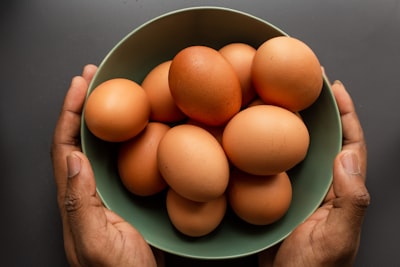 Fresh brown shell eggs in a bowl